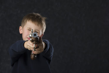 six year old with gun